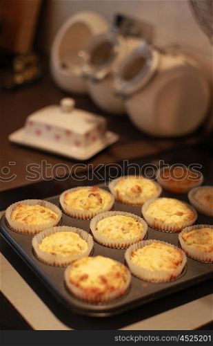Tray of freshly baked cup cakes straight out of oven