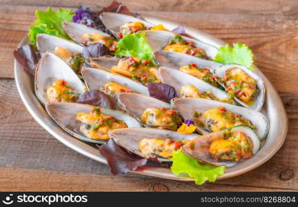 Tray of thai glazed half shell mussels 