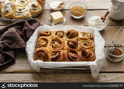 tray with cinnamon rolls high angle
