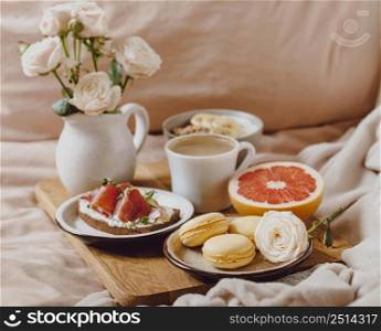 tray with morning coffee sandwich bed