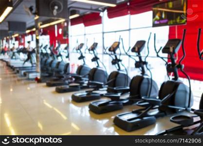 Treadmill in sport gym interior and fitness health club with sports exercise equipment and exercising cardio workout.