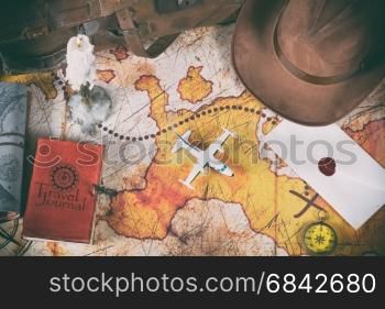 Treasure map of an adventurer and his belongings