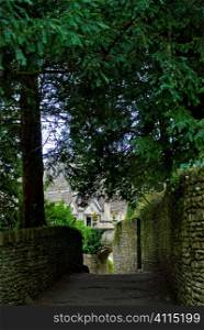 Trees and footpath in English village