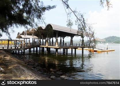 Trees and modern pier in Lumut, Malaysia