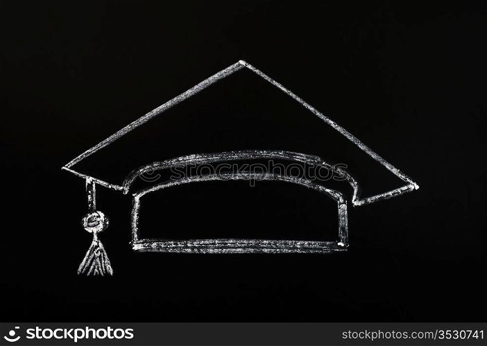 Trencher cap for graduation concept drawn with chalk on a blackboard background