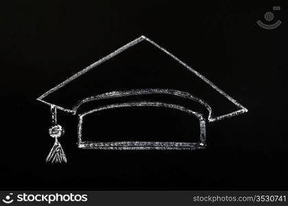 Trencher cap for graduation concept drawn with chalk on a blackboard background