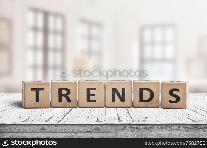 Trends sign in a bright home on a wooden desk with white paint