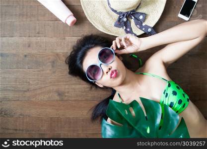 Trendy asian woman with fashion summer set on wooden background,. Trendy asian woman with fashion summer set on wooden background, Top view with copy space