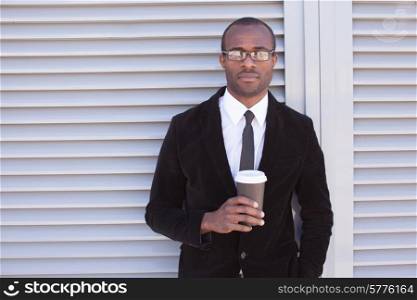 trendy black man have coffee break outdoors