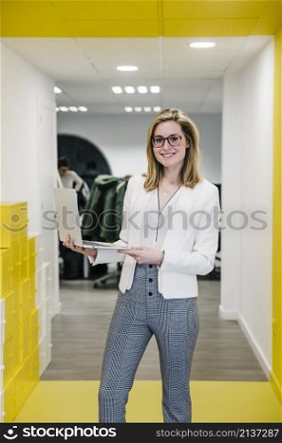 trendy businesswoman with laptop office
