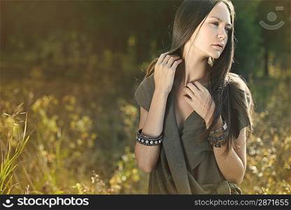 trendy look, a beautiful girl on the nature, fashion spring autumn
