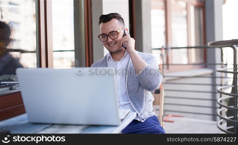 Trendy man working in startup office
