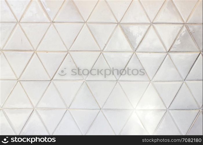 Triangle shaped ceramic tiles wall texture background