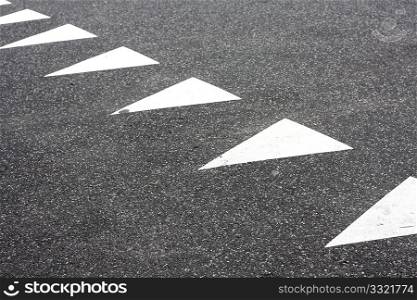 Triangular markings on a road