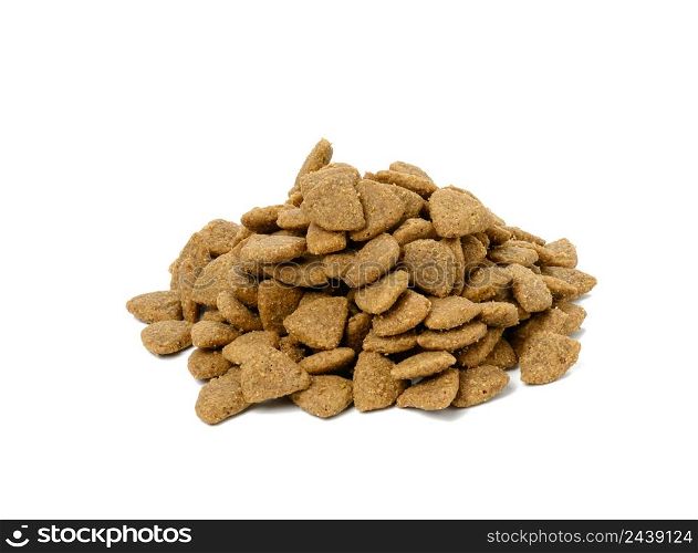 triangular pieces of animal food on a white background. Pile of nutritious food