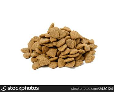 triangular pieces of animal food on a white background. Pile of nutritious food