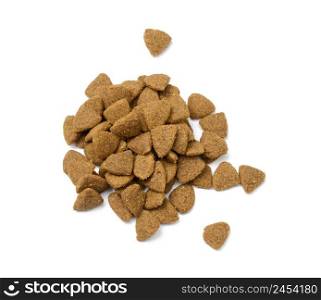 triangular pieces of animal food on a white background. Pile of nutritious food, top view