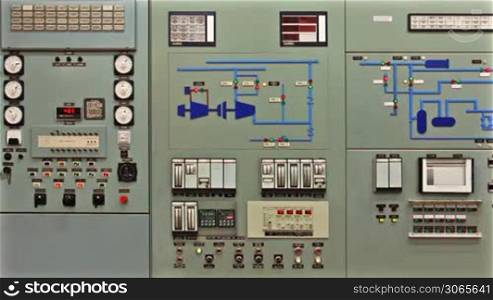 triggered audio-visual emergency warning alarms on main control panel of compressor station, engineer comes and disables it