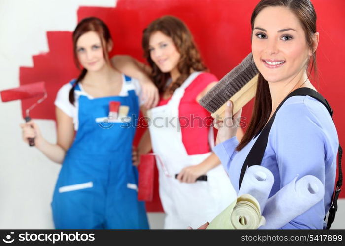 Trio of female decorators