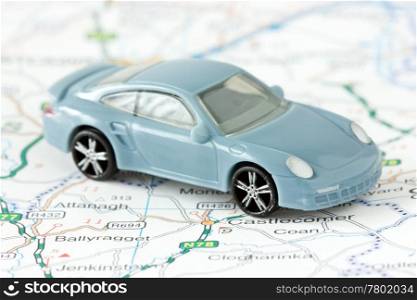 trip planning and travel. small car on map background