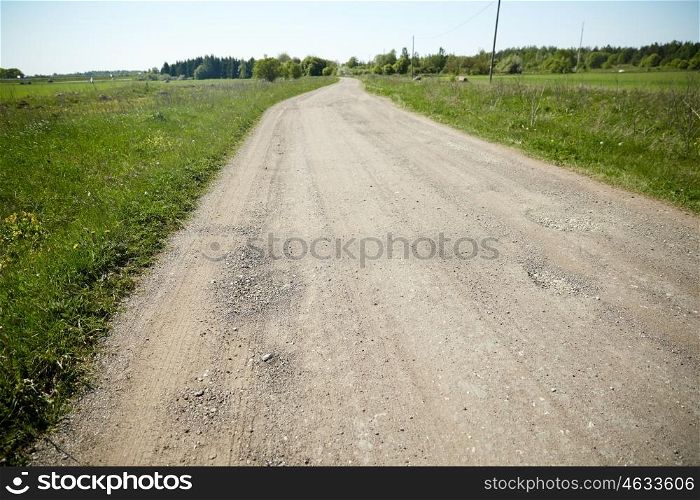 trip, travel and countryside concept - country road at summer. country road at summer