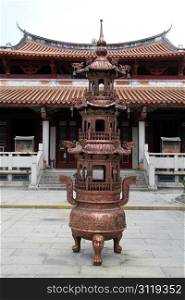 Tripod in the inner yard of buddhist temple in Quanzhou, China