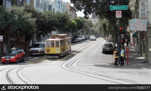 Trolley Car takes a bunch of passengers around San Francisco