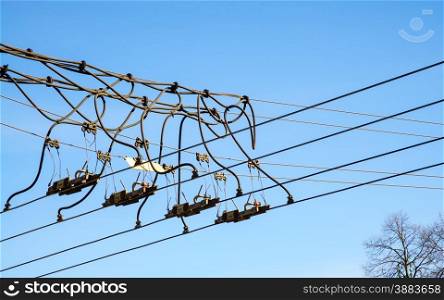 Trolley overhead line wire switch. Electrical cable. Electricity used in ecological transportation.. Trolley overhead line wire switch