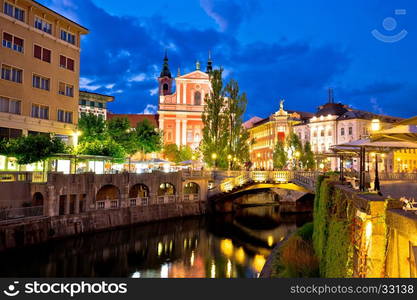 Tromostovje bridge and Presern square in Ljubljana evening view, capital of Slovenia