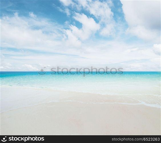 Tropical beach and ocean. Tropical beach and ocean. Day shot background. Tropical beach and ocean