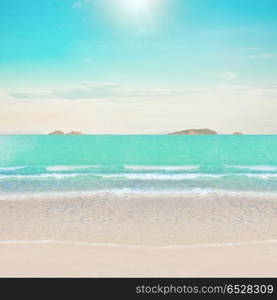 Tropical beach and ocean. Tropical beach and ocean. Day shot outdoor scene. Tropical beach and ocean