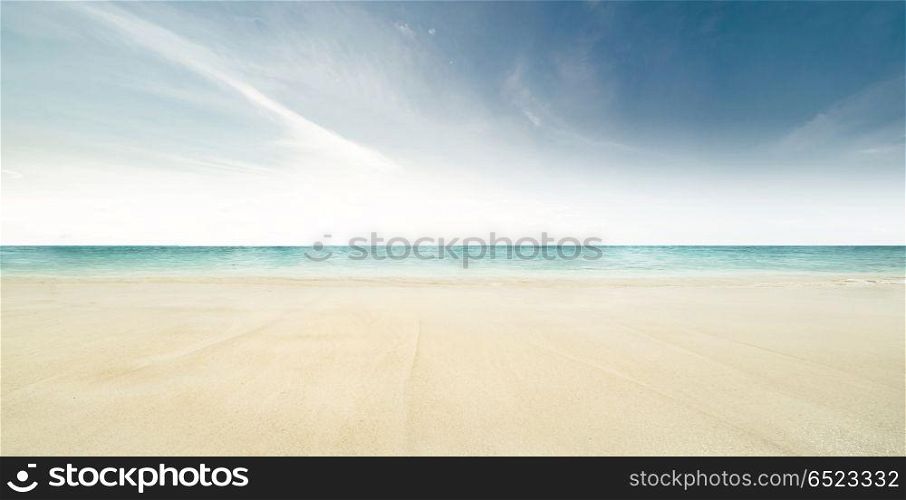 Tropical beach and ocean. Tropical beach and ocean. Sun and clouds. Tropical beach and ocean