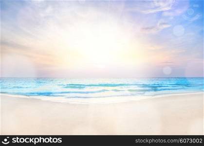 Tropical beach and sea at sunrise, beautiful colorful holiday background