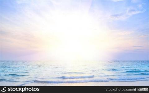 Tropical beach and sea at sunrise, beautiful colorful holiday background