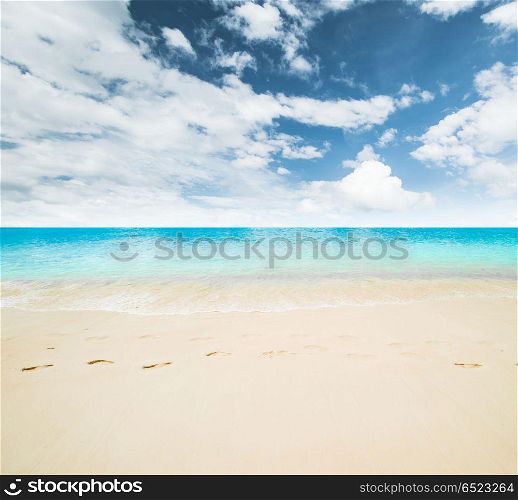 Tropical beach and sea. Tropical beach and sea. Sky and clouds. Tropical beach and sea