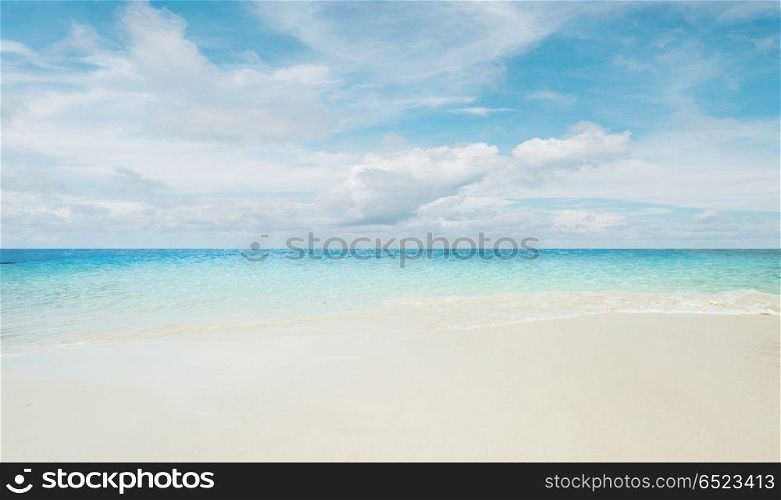 Tropical beach and sea. Tropical beach and sea. Sky and clouds. Tropical beach and sea