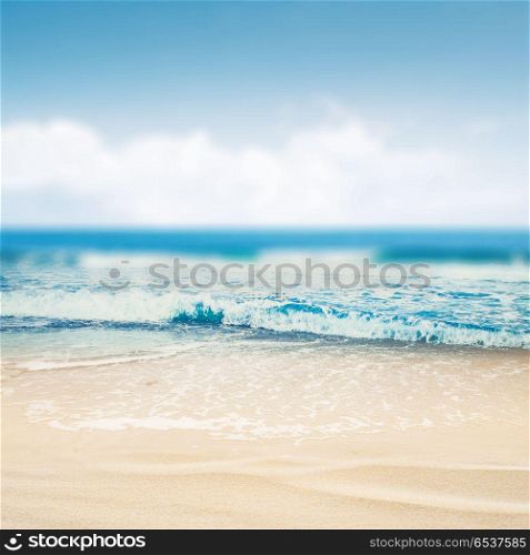 Tropical beach defocused background. Tropical beach defocused background. Summer paradise seascape. Tropical beach defocused background