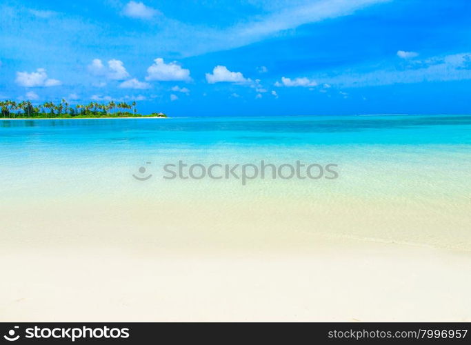 tropical beach in Maldives with few palm trees and blue lagoon&#xA;&#xA;