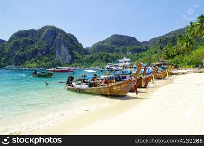 Tropical beach, longtail boats, Andaman Sea, Thailand