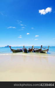 Tropical beach, longtail boats, Andaman Sea, Thailand