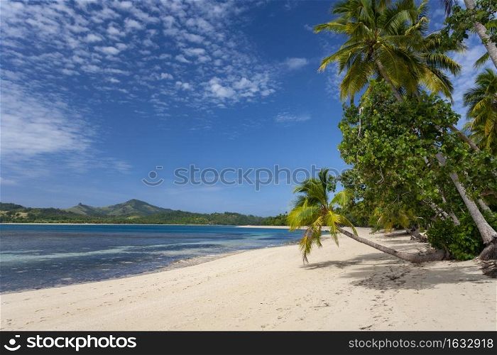 Tropical beach on one of the islands of the Yasawa Islands in Fiji, South Pacific.