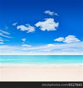 Tropical beach outdoor scene. Tropical beach, sand and sky outdoor scene. Tropical beach outdoor scene