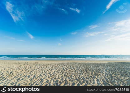 Tropical beach with clear water and blue sky