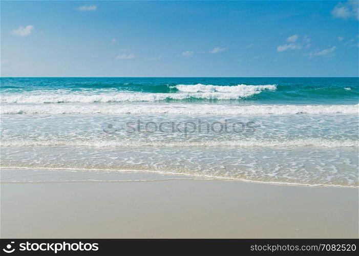 Tropical beach with clear water and blue sky