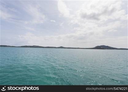 Tropical blue sea with island in background; Koh Samui; Thailand