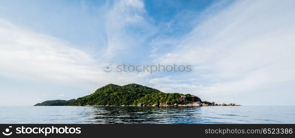 Tropical caribbean island in open ocean. Tropical caribbean island in open ocean ultramarine water. Tropical caribbean island in open ocean