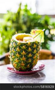 Tropical cocktail in ananas