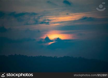 tropical forest mountain layers, sunset time with nature