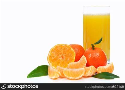 Tropical fruit composition - glass of fresh orange juice and pieces of orange or tangerine isolated on a white background (copy space)