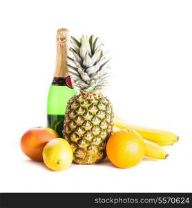 Tropical fruits and champagne isolated on white